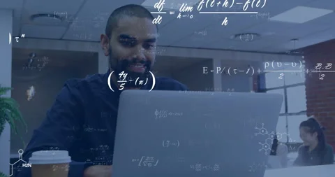 Animation of equations at elements over happy biracial male student using laptop Stock Footage 266922180