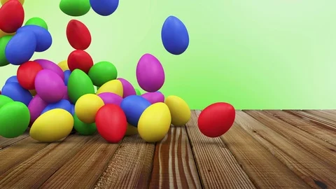 Animation of Falling of Colorful Easter Eggs on Vintage Wooden Table Stock Footage 73345691
