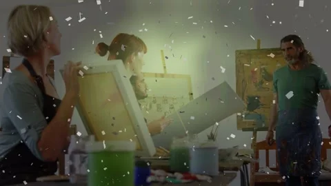 Animation of falling confetti over diverse group of people art class Stock Footage 325773744