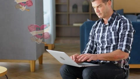 Animation of falling hearts over men using laptop Stock-Footage 329765666