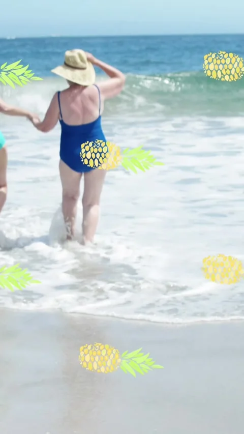 Animation of falling pineapples over caucasian senior group of woman on the Video stock 324019953