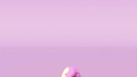 Animation of falling tasty pink donuts on pink background. Animation of seamless Stock Footage 169923937