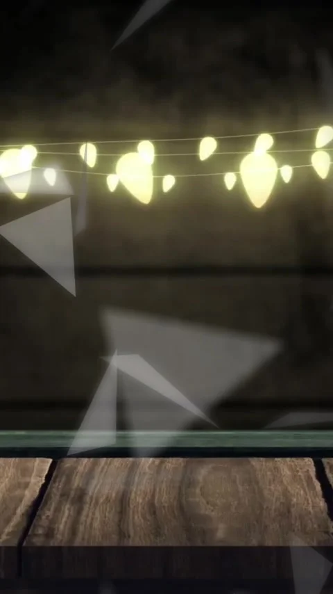 Animation of falling triangles over christmas fairy lights decorations Stock Footage 343827725