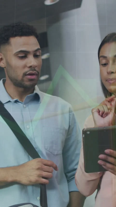 Animation of financial data and graphs over diverse female and male coworkers in Stock Footage 341956291
