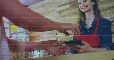 Animation of financial data over caucasian people using payment terminal Stock Footage 330336608