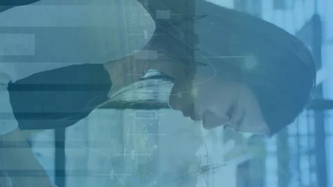 Animation of financial data processing and cityscape over businesswoman in 動画素材 312547611