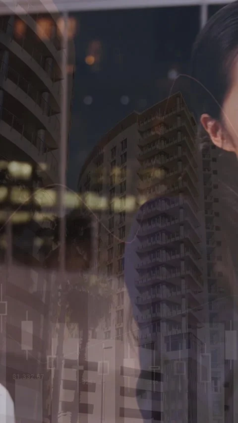 Animation of financial data processing and cityscape over diverse business Stockbeeldmateriaal 323578305