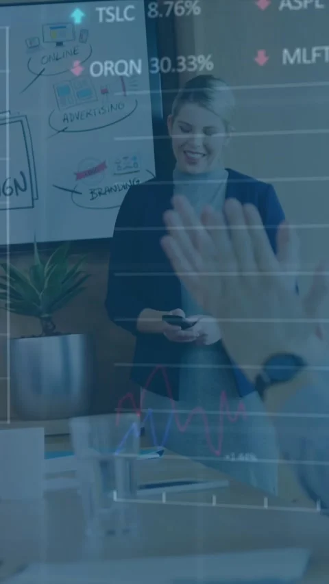 Animation of financial data processing on diverse colleagues clapping for Stock Footage 344693931