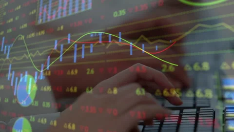 Animation of financial data processing over people typing on computer keyboards Stockbeeldmateriaal 152702633