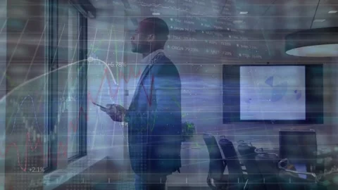Animation of financial data processing over african american man using tablet Stock Footage 202582463