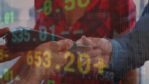Animation of financial data processing over caucasian man paying at payment Stock Footage 220378648