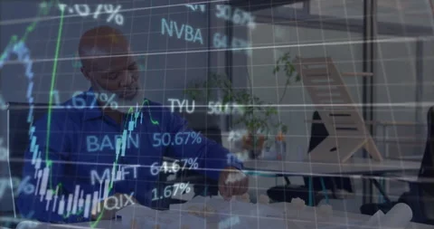 Animation of financial data processing over african american businessman in Stockbeeldmateriaal 258730560