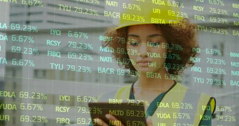 Animation of financial data processing over female architect using tablet Stock Footage 310033102