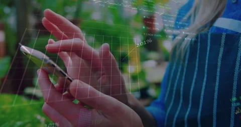 Animation of financial data processing over caucasian woman using smartphone Video stock 310407676