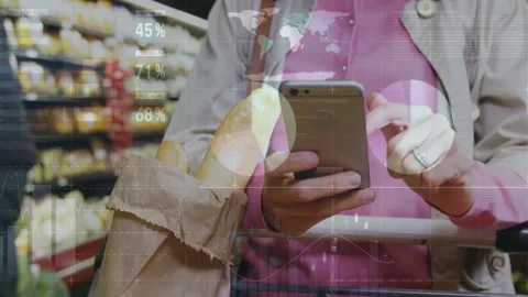 Animation of financial data processing over caucasian woman using smartphone Stock Footage 310682751