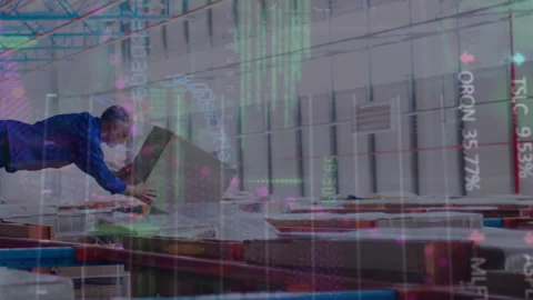 Animation of financial data processing over caucasian man in warehouse 動画素材 312422148