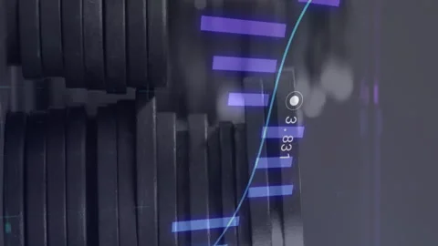 Animation of financial data processing over stacks of coins Stock Footage 312532949