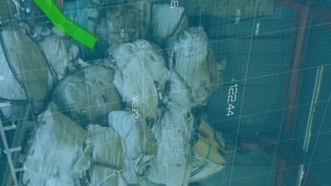 Animation of financial data processing over waste in warehouse Stock Footage 313355569