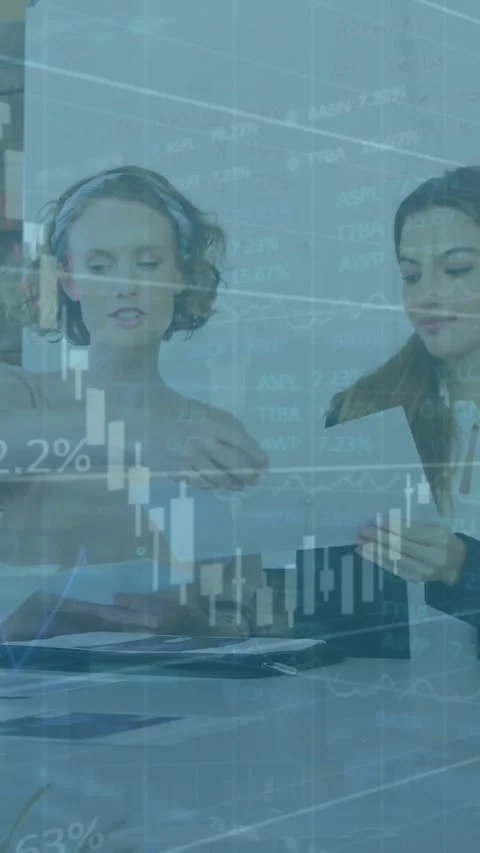 Animation of financial data processing over diverse colleagues discussing over Stock Footage 320922147
