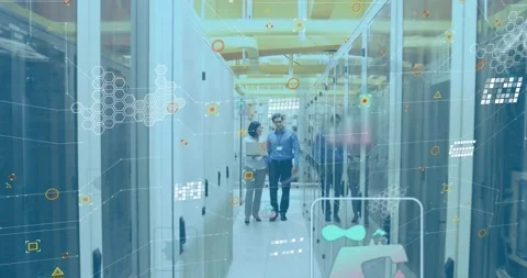 Animation of financial data processing over diverse it engineers and computer Stock Footage 326422607