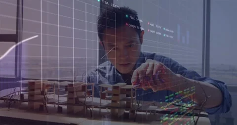 Animation of financial data processing over male architect working Stock Footage 326875939