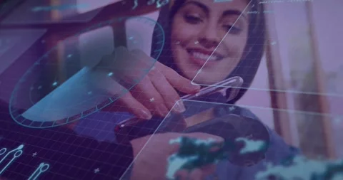 Animation of financial data processing over caucasian womenusing payment Stock Footage 328353876