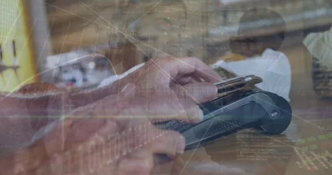 Animation of financial data processing over people using smartphone and payment Stock Footage 328456779