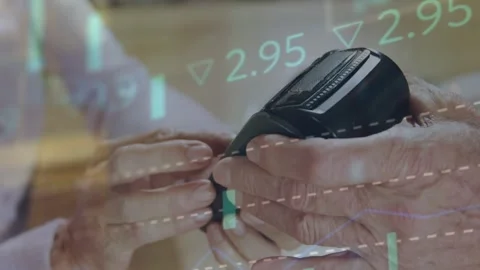 Animation of financial data processing over caucasian woman paying at payment Stock Footage 330104949