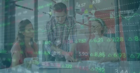 Animation of financial data processing over diverse colleagues discussing over Stock Footage 330344521