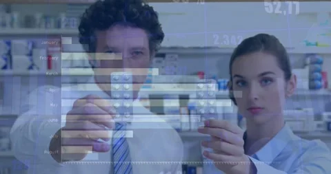 Animation of financial data processing over caucasian male and female pharmacist Stock Footage 330469463
