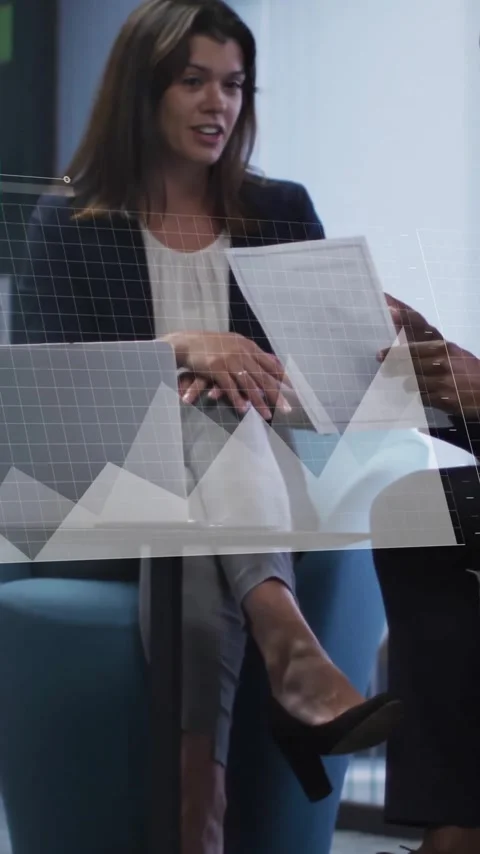 Animation of financial data processing over diverse colleagues discussing work Stock Footage 341927819