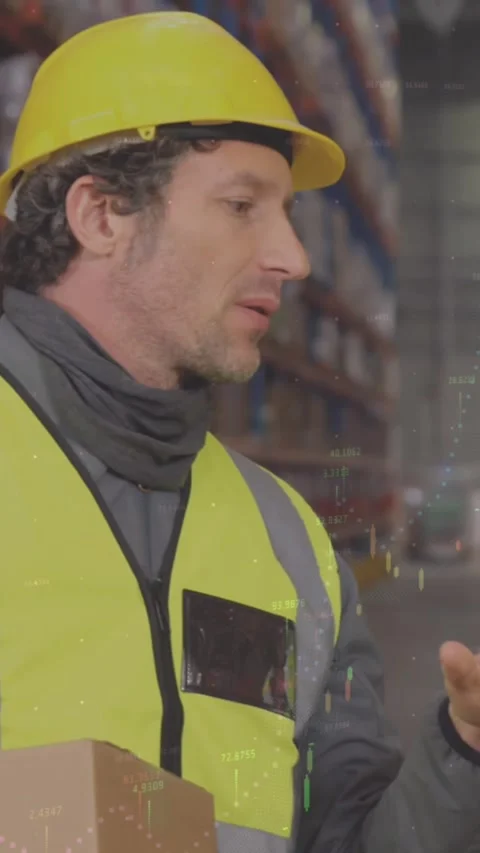 Animation of financial data processing over two caucasian warehouse worker Stock Footage 341976277