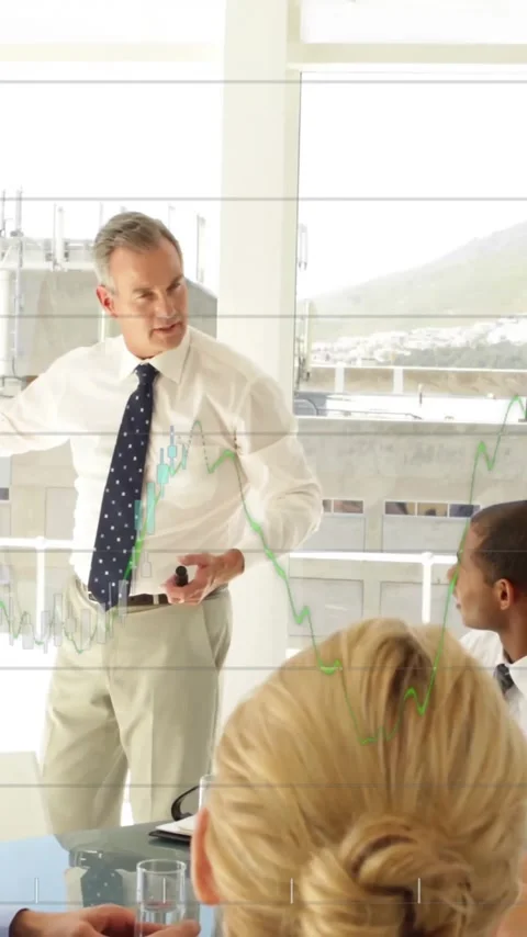 Animation of financial data processing over diverse colleagues having meeting in Stock Footage 342812485