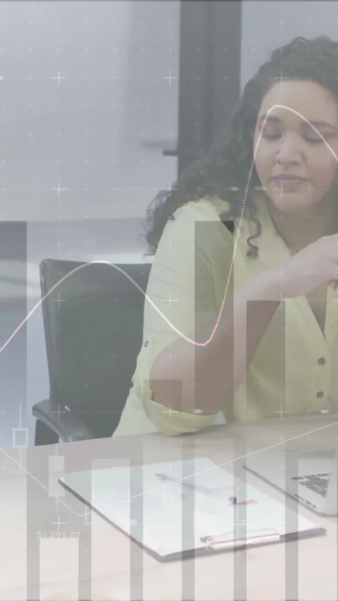 Animation of financial data processing over diverse business people in office Stock Footage 343028219