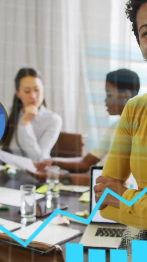 Animation of financial data processing over diverse business people in office Stock Footage 343504734
