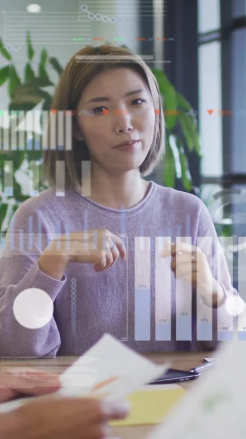 Animation of financial data processing over diverse colleagues discussing work Stock Footage 343505100