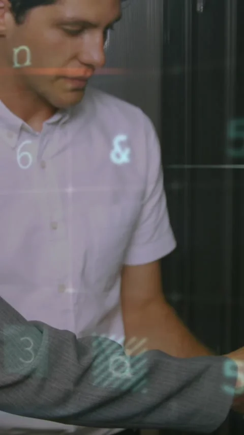 Animation of financial data processing over caucasian server room workers Stock Footage 343615017