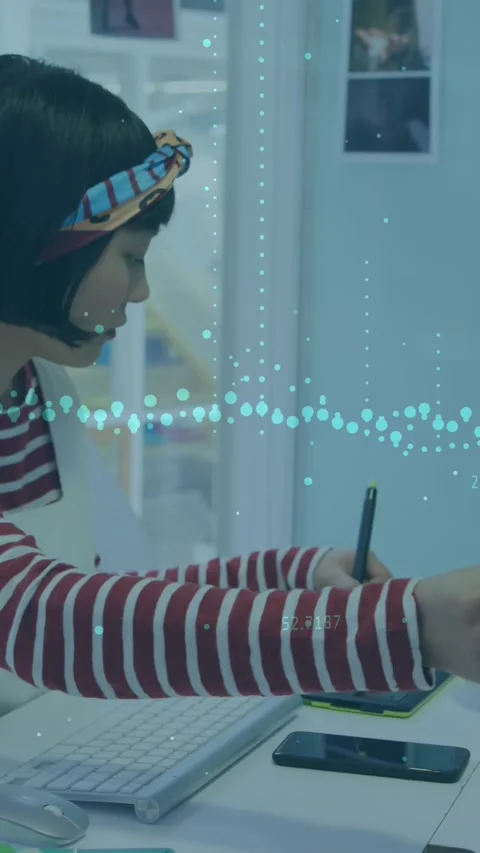 Animation of financial data processing over businesswoman using computer Stock Footage 343739145