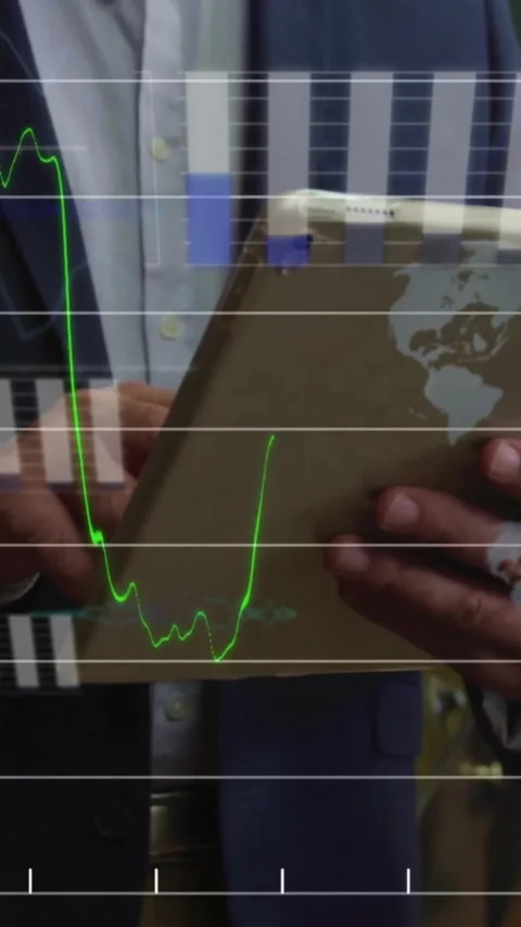 Animation of financial data processing over caucasian man using tablet Vidéo 343868063