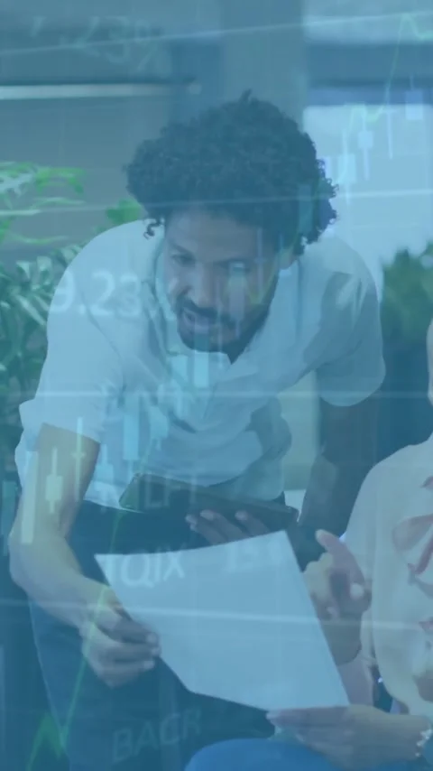 Animation of financial data processing over diverse colleagues discussing work Stock Footage 343887388