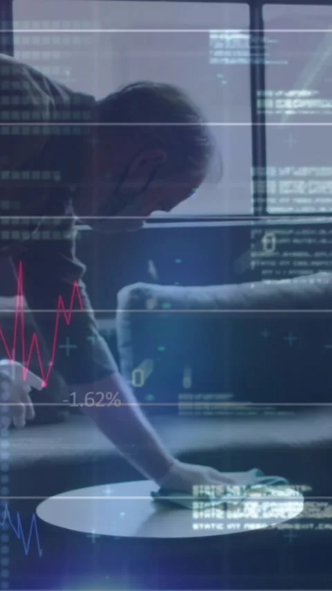 Animation of financial data processing over man in face mask disinfecting table Stock Footage 344402442