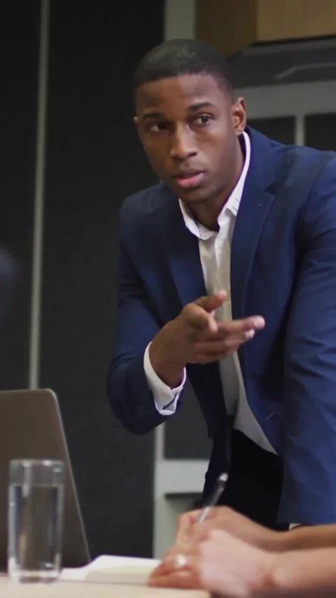 Animation of financial data processing over diverse colleagues discussing work Stock Footage 344595892