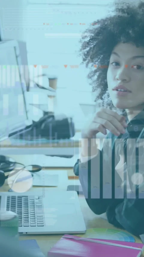 Animation of financial data processing over businesswoman in office Stock Footage 344636994