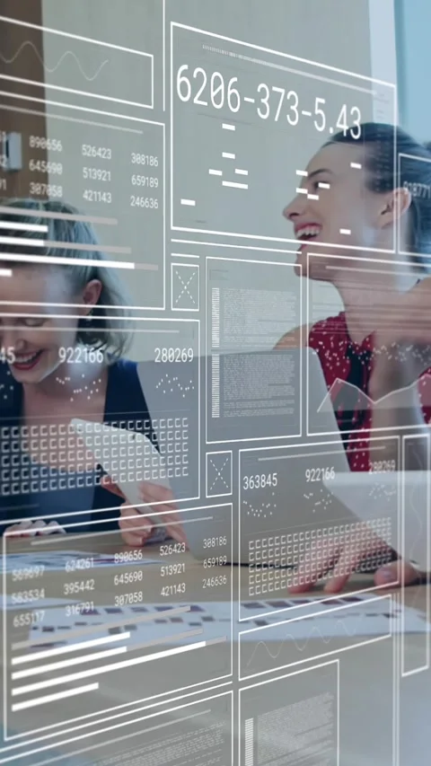 Animation of financial data processing over diverse business people working in Stock Footage 344706262