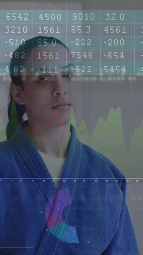 Animation of financial data processing over female karate fighter Stock Footage 344746218