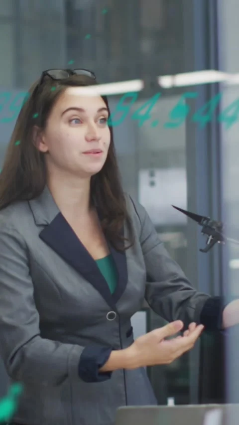 Animation of financial data processing over business people working in office Stock Footage 344774504