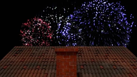 Animation of fireworks exploding over house roof and chimney Stock Footage 164318021