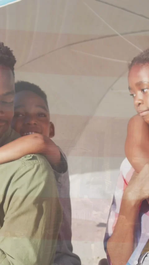Animation of flag of usa over african american family at beach Stock Footage 343887671