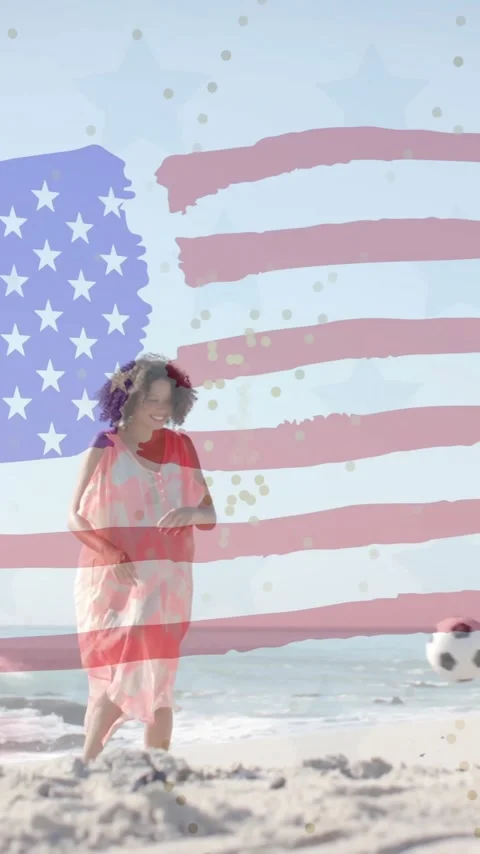 Animation of flag of usa over happy diverse friends playing ball on beach in Stock Footage 343079124
