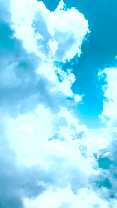 Animation of Flight Through White clouds in the Blue Sky.  Stock Footage 220358333